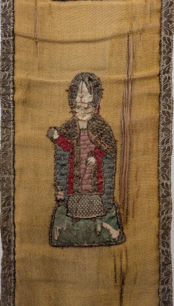Five embroidered silk orfroi ornaments depicting...