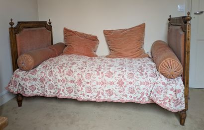 Natural wood bed carved with channels and...