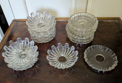 Cristallerie de BACCARAT. Suite de neuf bobèches...