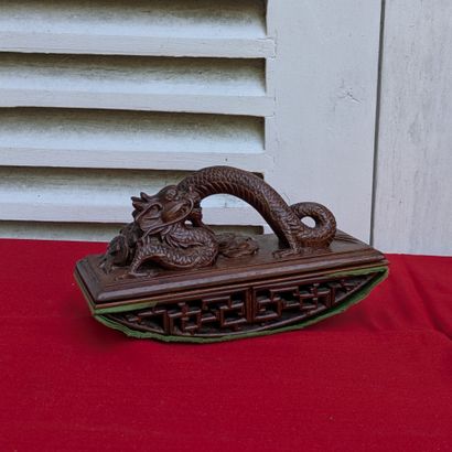 Mahogany blotter, the grip depicting a dragon,...
