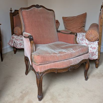 Natural wood Bergère, molded and carved with...