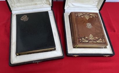 Two missals, the covers decorated with a...