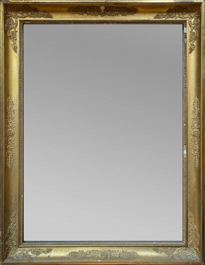Mirror with gilded wood frame decorated with...