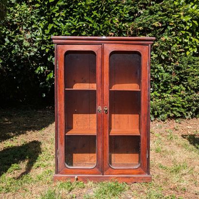 Small display case in mahogany-stained wood....