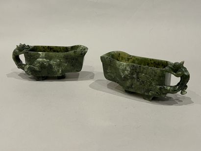 Pair of serpentine libation cups, the handles...