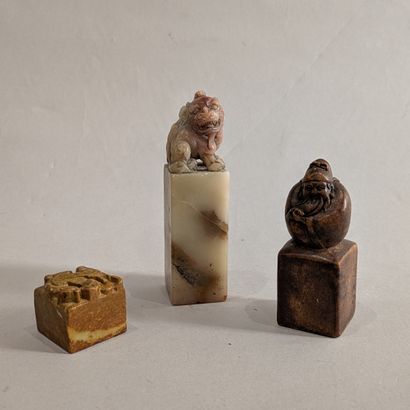 Set of three hardstone seals: one with a...