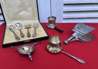 Silver-plated metal: three tea strainers,...