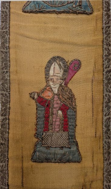 Five embroidered silk orfroi ornaments depicting...