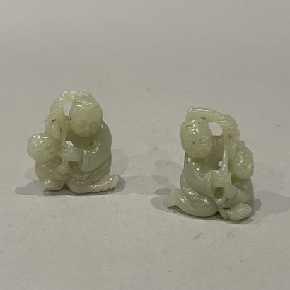 China, 20th century. Pair of small nephrite...