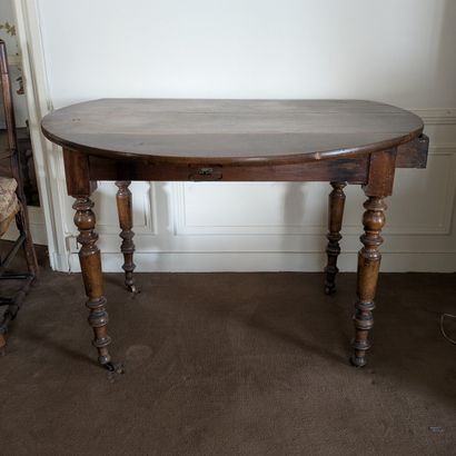 Fruitwood table, shuttered top, turned legs....