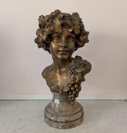 Gilded bronze bust of a young bacchant wearing...