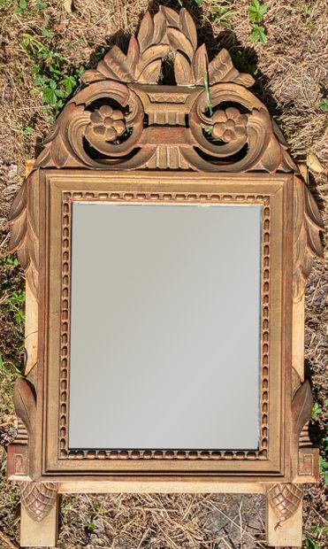 Small mirror with cream lacquered and gilded...