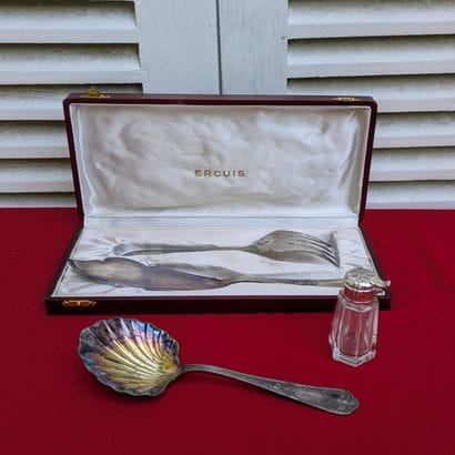 Work by Ercuis. A silver-plated fish service...