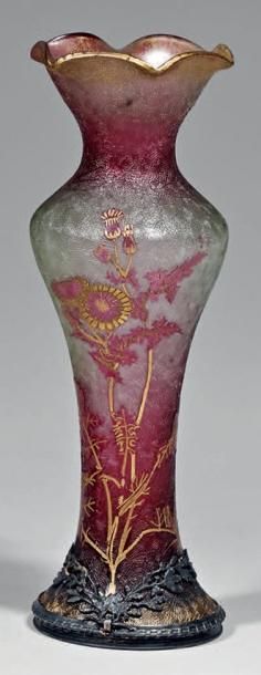 Maison BACCARAT
Petit vase à bord mouvementé...