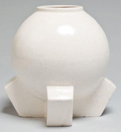 Travail des années 50
Vase boule en céramique...
