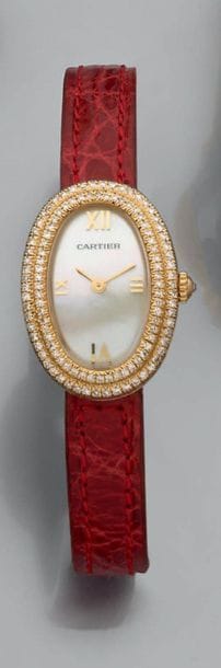 Montre bracelet de dame en or jaune modèle...