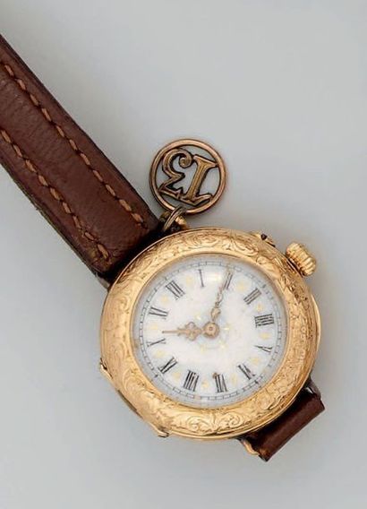 Montre de dame en or jaune à boîtier rond,...
