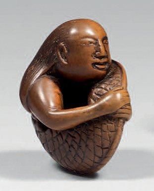 Netsuke en buis à patine brune, sirène se...