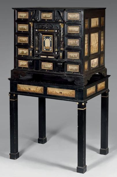 Cabinet en placage d'ébène et frises d'ondulations,...
