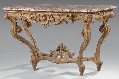 Console en bois doré de forme mouvementée...
