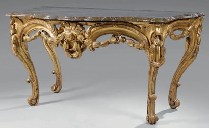 Table console en bois doré de forme mouvementée;...