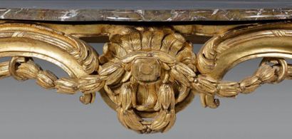Table console en bois doré de forme mouvementée;...
