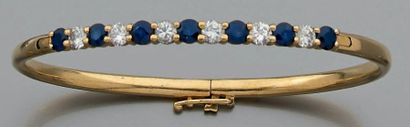 Bracelet rigide ouvrant en or jaune 18k (750)...