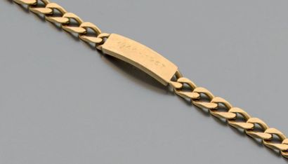 Bracelet gourmette d'identité en or jaune...