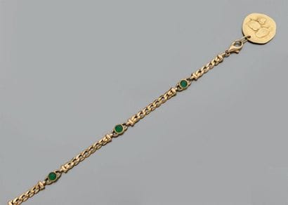 Bracelet en or jaune (750) à maille gourmette...