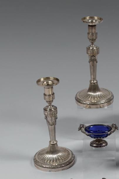 Paire de flambeaux et deux bobèches en argent,...