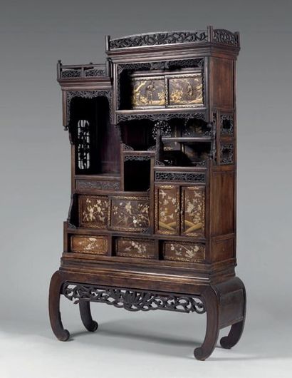 Meuble en palissandre à étagères, tiroirs...