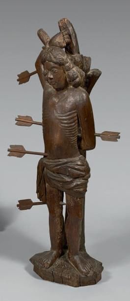 Statue de Saint Sébastien en bois sculpté.
Art...