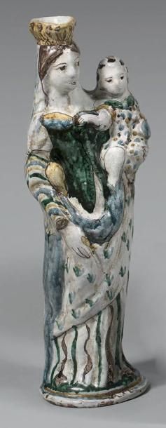 Statue de Vierge à l'Enfant en faïence polychrome.
XVIIIème...