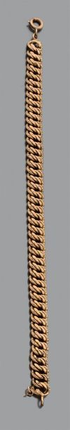 Bracelet en or jaune 18K (750) à maille gourmette...