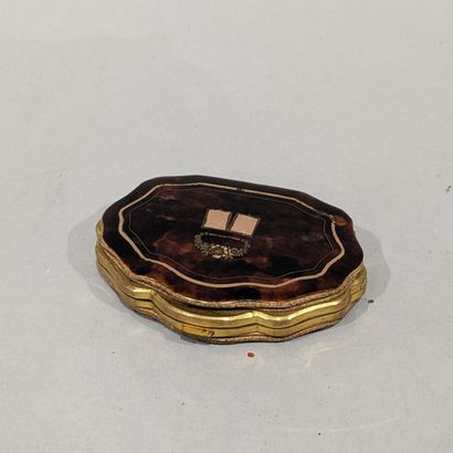 Porte-monnaie contour, les plats en écaille...