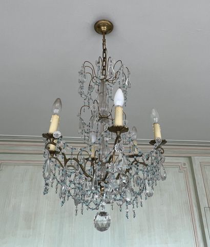 Lustre en bronze, le fût à balustre de cristal,...