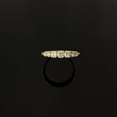 Bague jarretière en or jaune 18K (750), ornée...