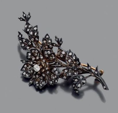 Broche trembleuse en argent et or jaune 18K...