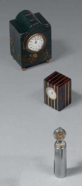 Ensemble composé de:
- un porte-montre en...