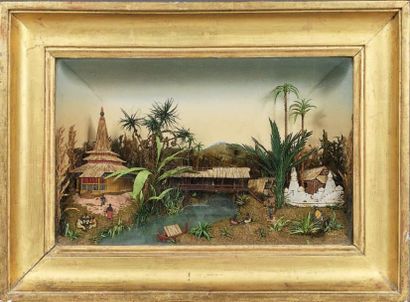 Deux dioramas dans des cadres en bois doré...