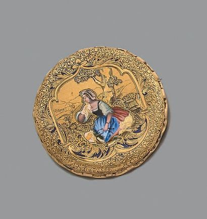 Broche ronde en or jaune 18K (750) ciselée...