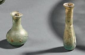 Lot composé de sept vases et coupes en verre.
Epoque...