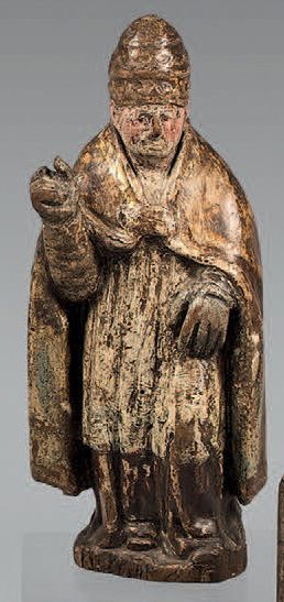 Statuette en bois polychrome et partiellement...
