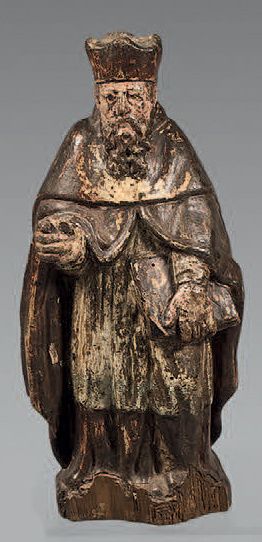 Statuette en bois sculpté avec reste de polychromie...