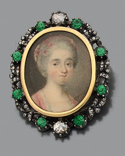 Broche ovale en argent et or jaune 18K (750)...