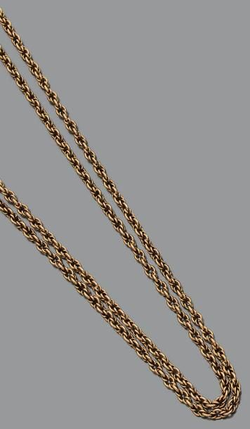 Sautoir en or jaune 18K (750) à maille forçat...