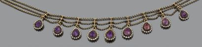 Collier en or jaune 18K (750) à trois chaînes...