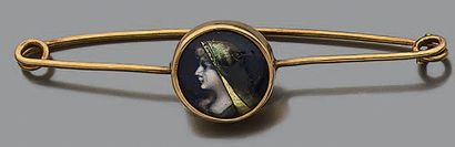 Broche en or jaune 18K (750) appliqué d'un...
