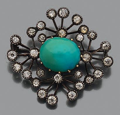 Broche en or 18K (750) ornée d'un cabochon...