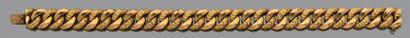Bracelet en or jaune 18K (750) à maille gourmette...